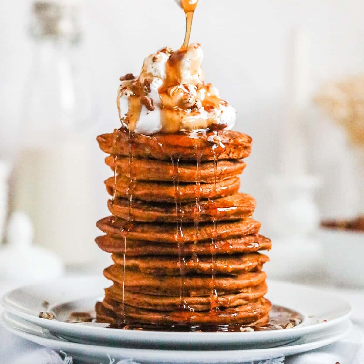 pumpkin pancakes on a white plate