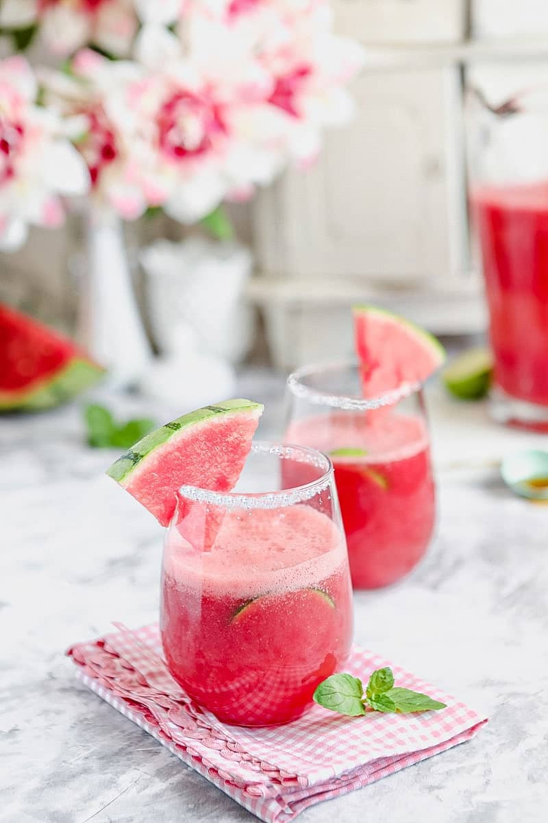 2 watermelon drinks on a marble table