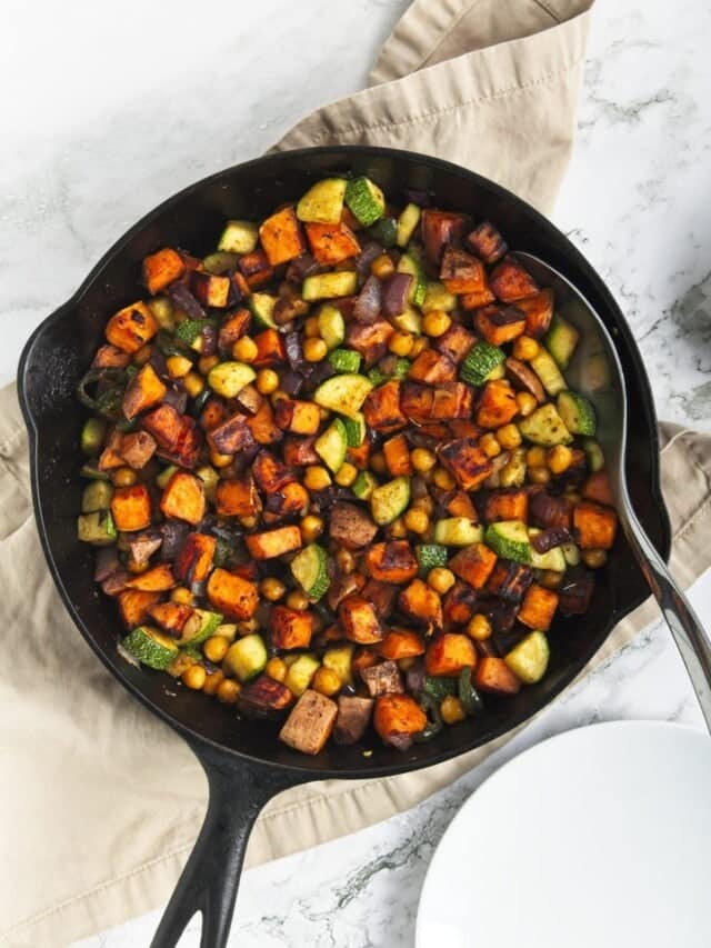 overhead view of sweet potato breakfast hash in a cast iron skillet