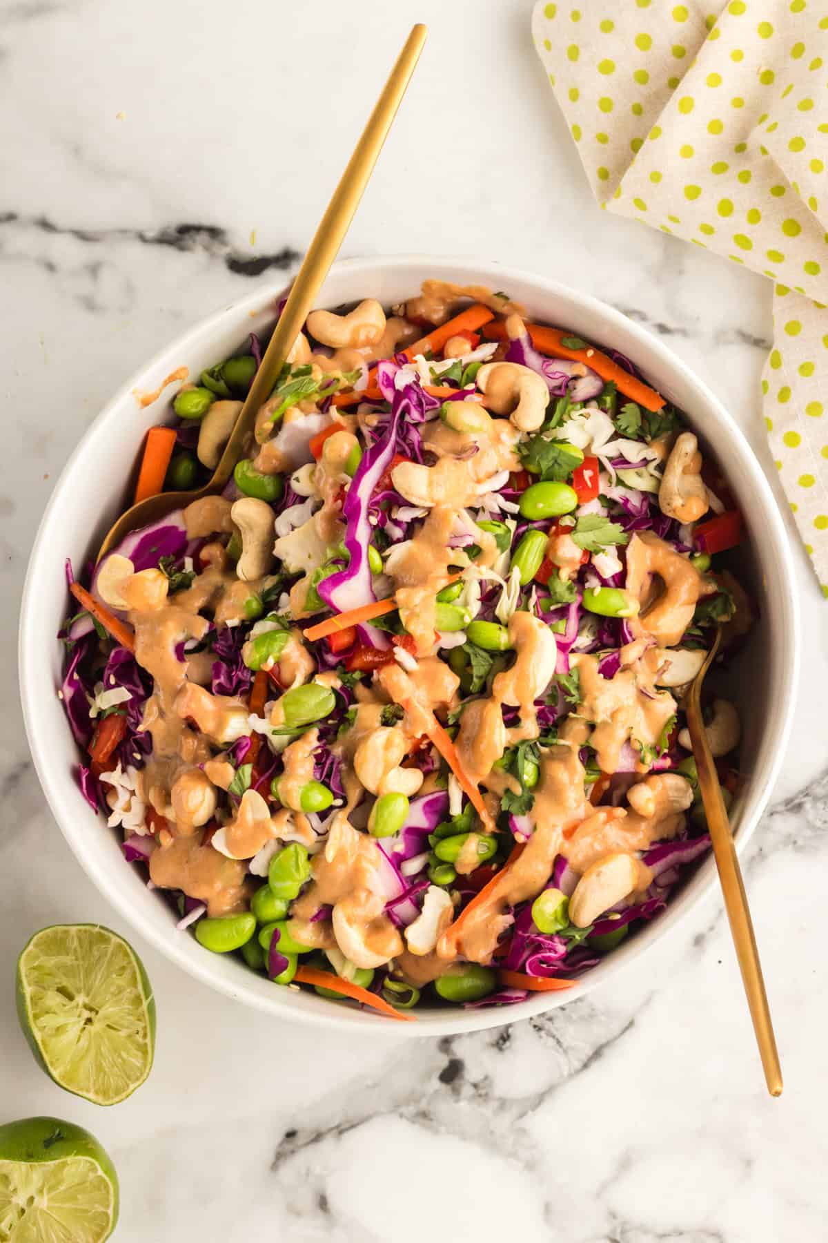 chopped thai salad on a white plate